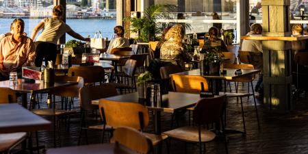 Diners at The Bar at the end of Wharf